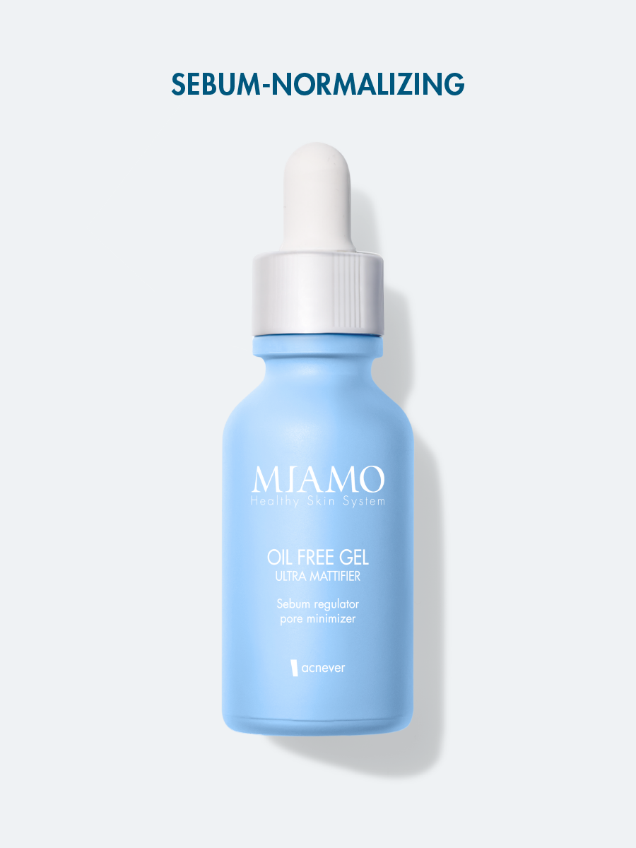 Flacone chiuso da 30 ml di colore azzurro del gel OIL FREE GEL su sfondo grigio. Il tappo è bianco e a forma di pipetta.